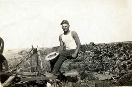 Grandpa Lee plowing at Grey Duck Garlic