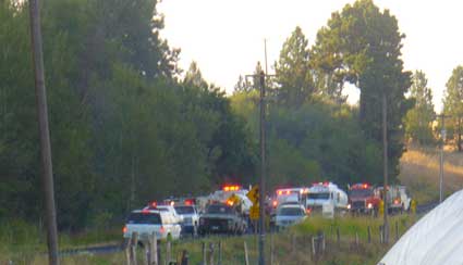 Fire trucks on Parvin Road by Susan Fluegel at Grey Duck Garlic