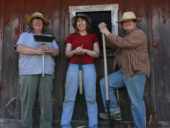 Jane, Susan and Edna lean on their tools